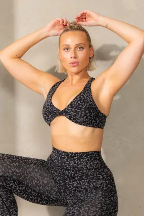 Momentum Twist Sports Bra | Black Leopard